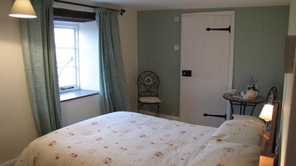 Worswell Barton B&B farmhouse gunrow bedroom x.jpg